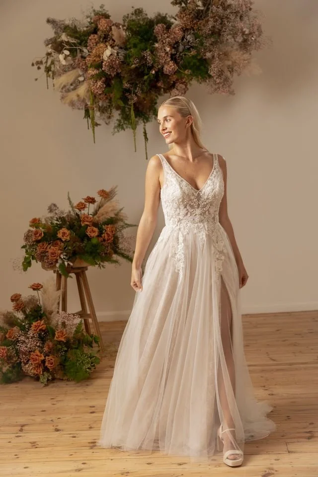 lace-v-neck-tulle-and-lace-a-line-wedding-dress-at-eden-bridal-belfast.jpeg