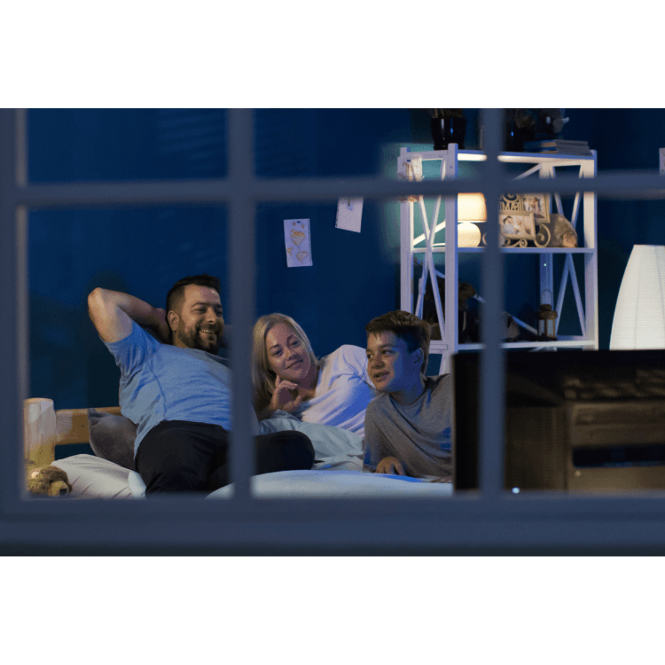 family together in a living room