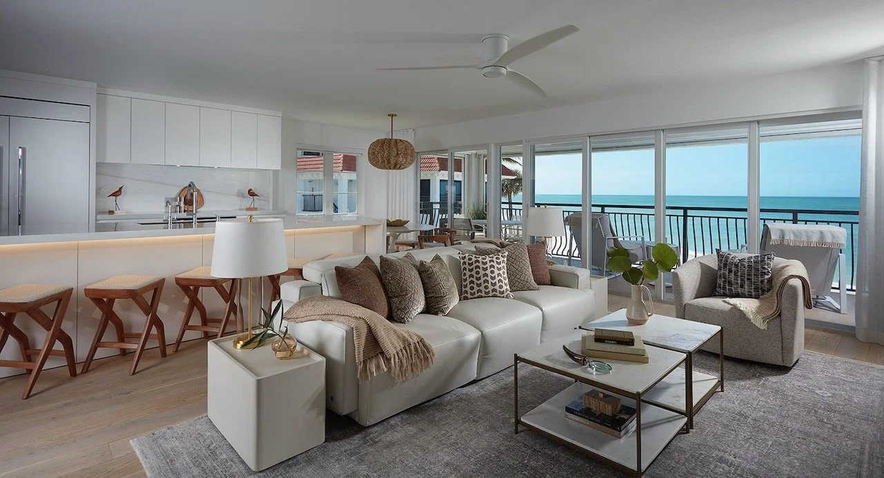 gulfshore-getaway-living-room-gulf-views-rattan-pendant-gloria-black-design.jpeg