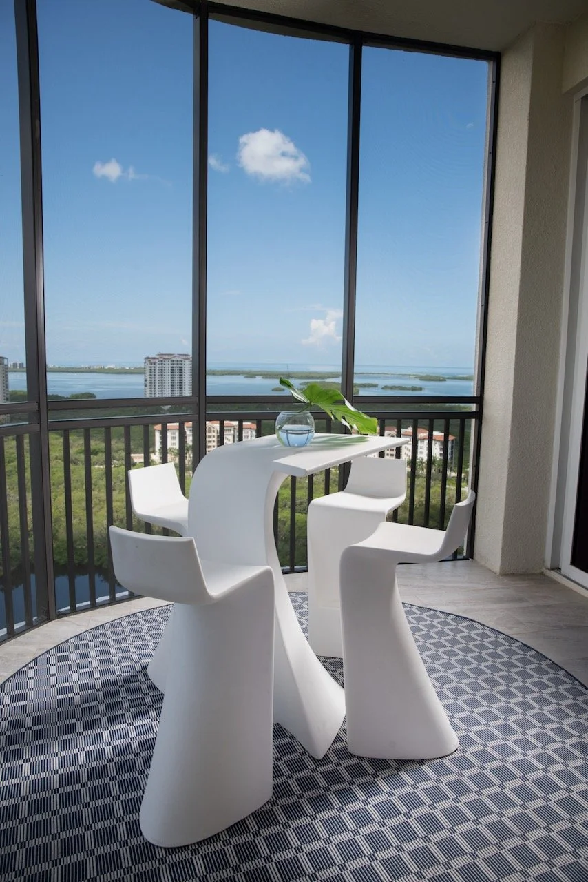 Modern Penthouse high-rise balcony with panoramic water views Bonita Springs Florida — Gloria Black Design