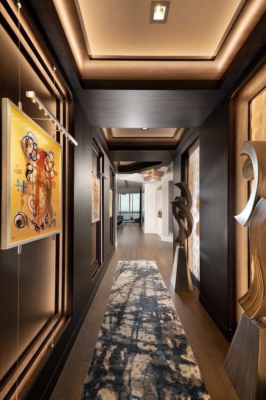 modern-penthouse-luxe-red-award-jewel-box-gallery-corridor-dark-walls-track-lighting-bonita-springs-gloria-black-design.jpeg