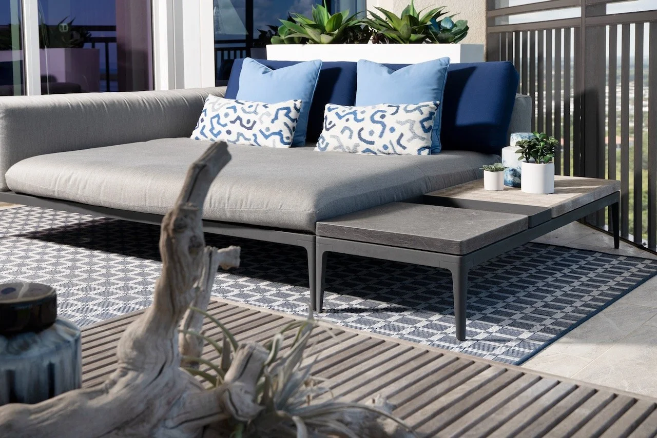 modern-penthouse-balcony-sectional-driftwood-geometric-tile-bonita-springs-gloria-black-design.jpeg