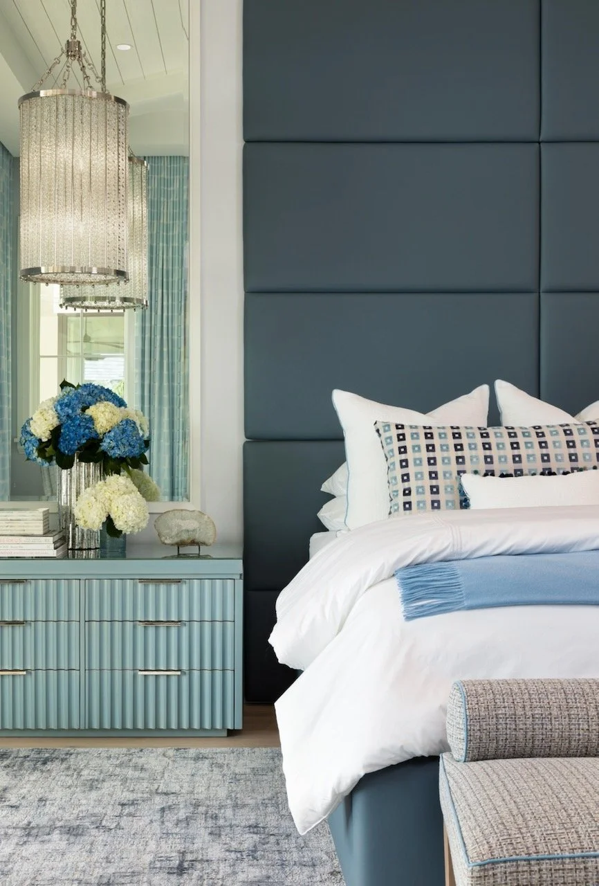 new-england-charmer-bedroom-blue-upholstered-headboard-blue-accents-gloria-black-design-©24.jpeg