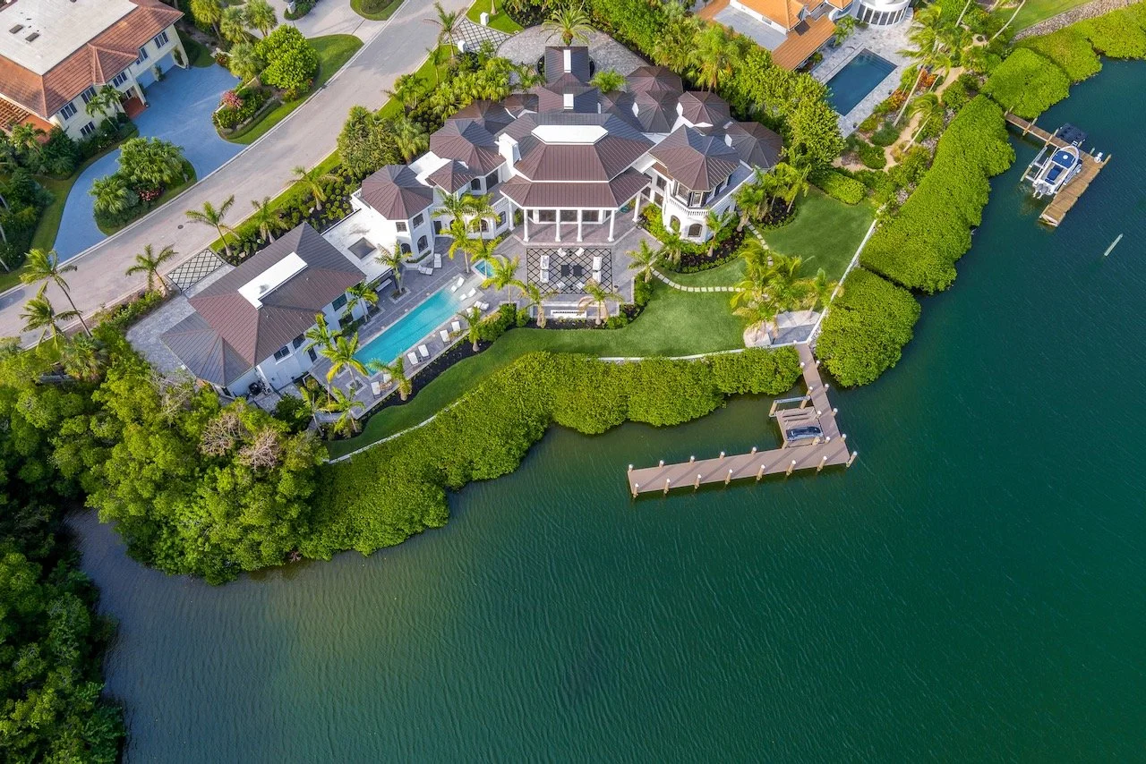 Aerial view of luxury waterfront estate — residential interior design consulting by Gloria Black Design Naples Florida