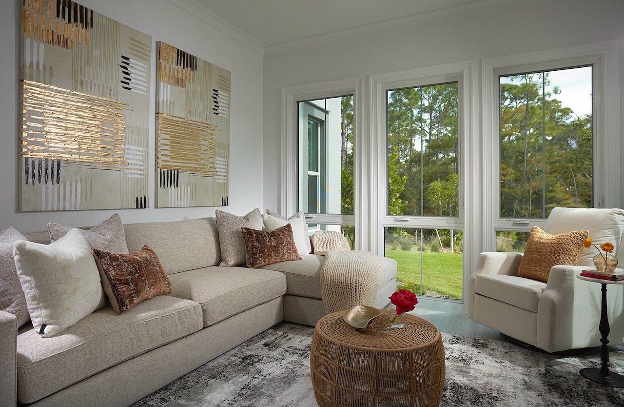 Golden Grotto light-filled vacation retreat living room with biophilic design and natural textures — Gloria Black Design Naples Florida