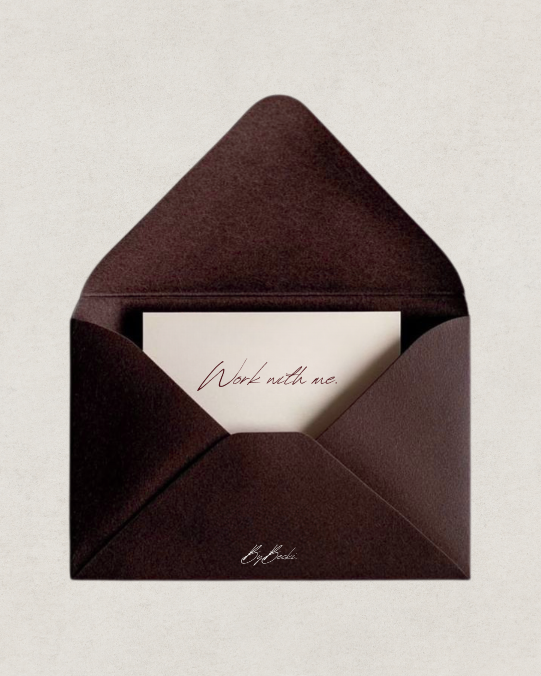 A deep burgundy envelope holding a white card with the handwritten message 'Work with me.' and the signature 'by Becki' underneath.