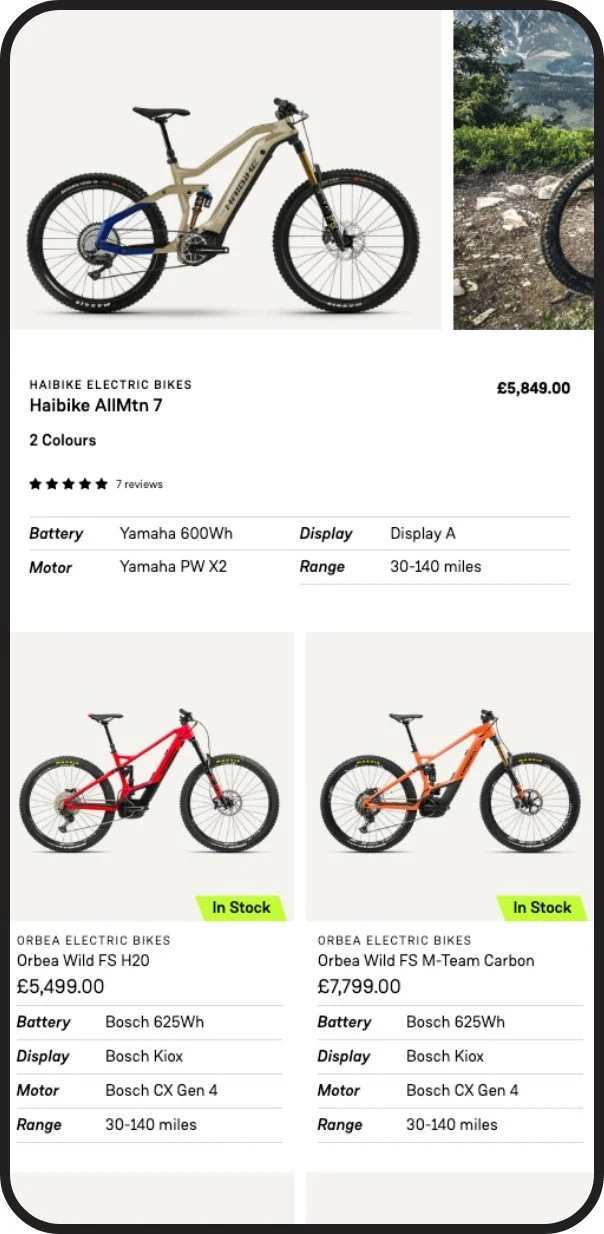An online bike shop listing featuring three different electric bikes with their prices, specifications, and availability. The top bike is a Haibike AllMtn 7 priced at £5,849, with 2 color options. The bottom left bike is an Orbea Wild FS H20 priced at £5,499, and the bottom right bike is an Orbea Wild FS M-Team Carbon priced at £7,799. Each bike's battery, display, motor, and range are listed, with stock status indicated for the Orbea bikes.