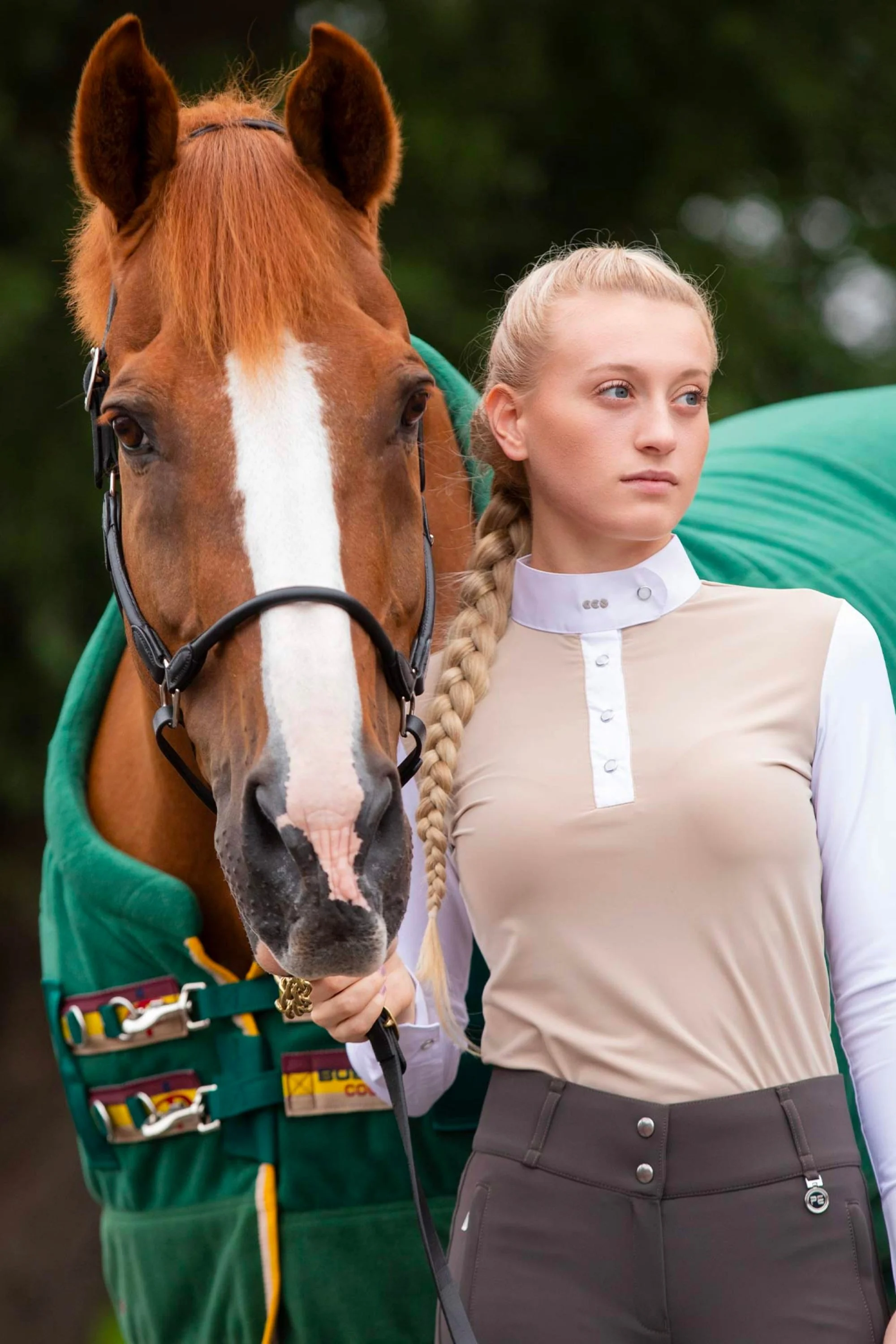 Premier-Equine-Lady-Standing-with-horse