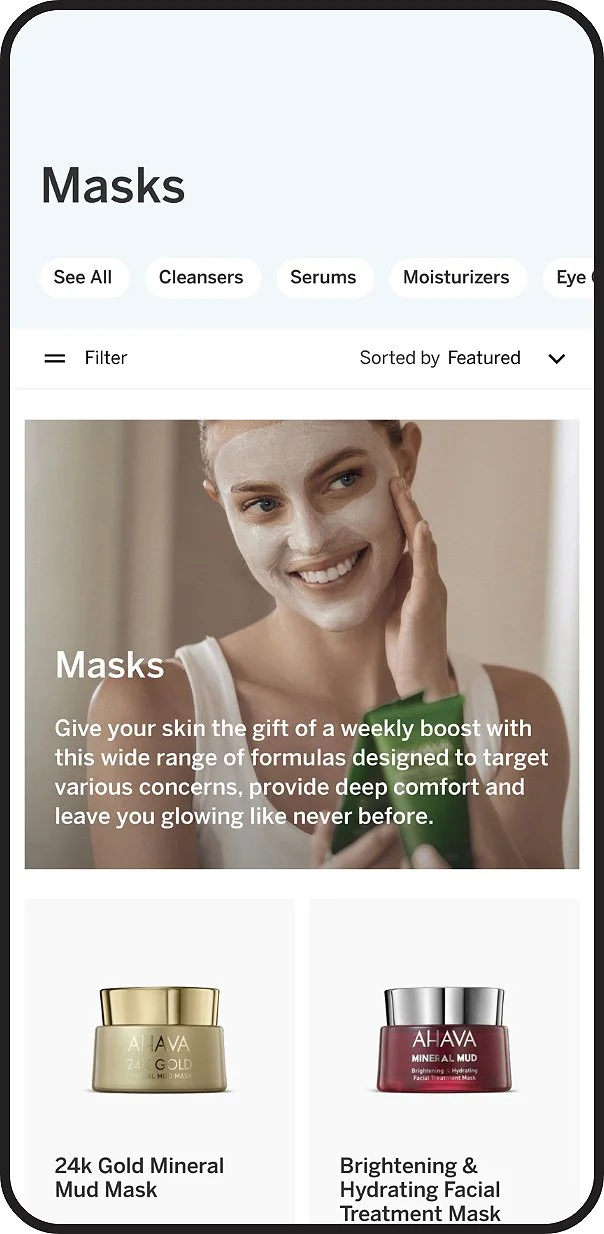 Online skincare store homepage displaying various masks, including a woman applying a white facial mask, and product images of 24k Gold Mineral Mud Mask and Brightening & Hydrating Facial Treatment Mask.