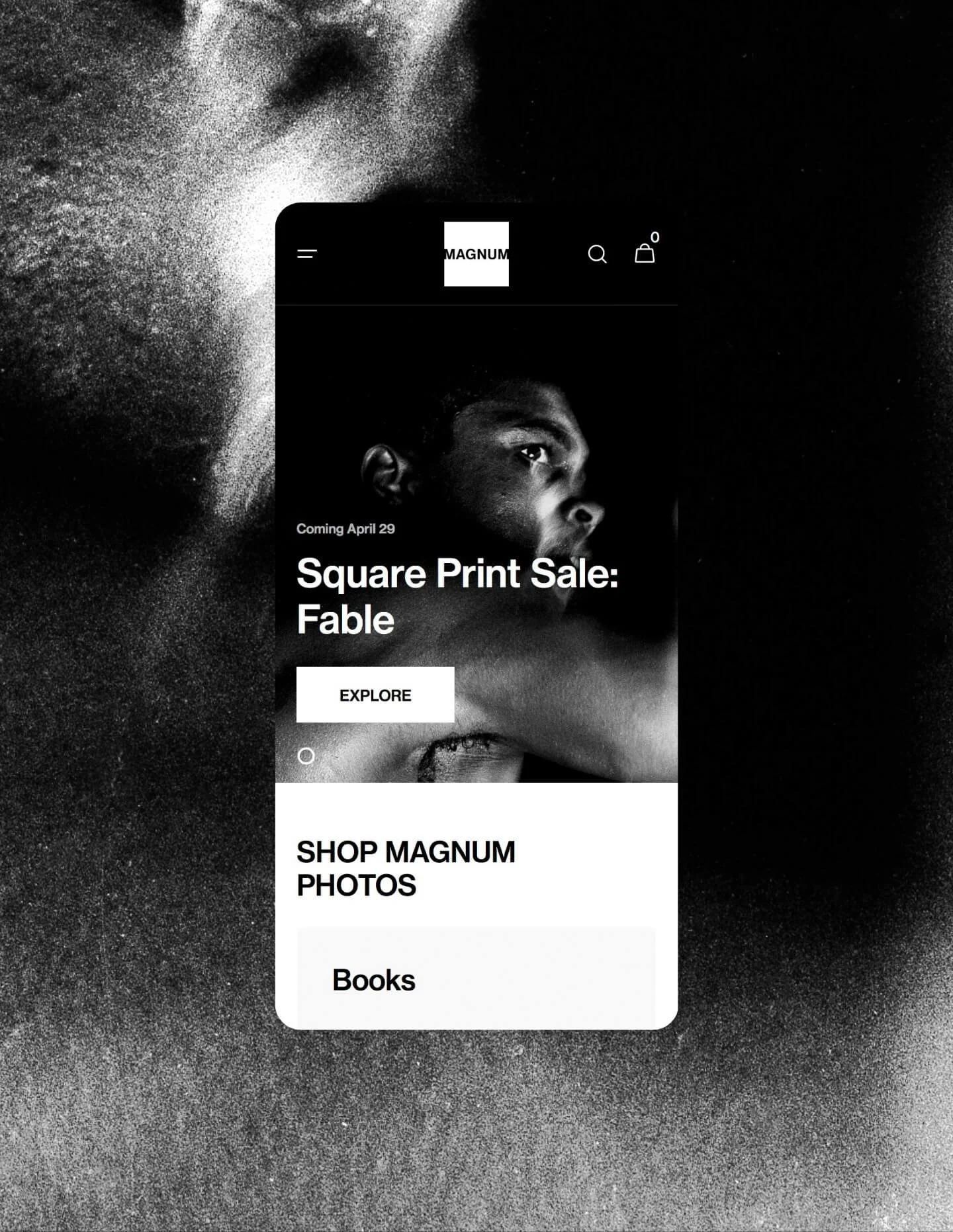 Black-and-white photo of a smartphone screen displaying a fashion website advertisement for a square print sale, with the text 'Coming April 29,' 'Square Print Sale: Fable,' and options to explore and shop photos or books.