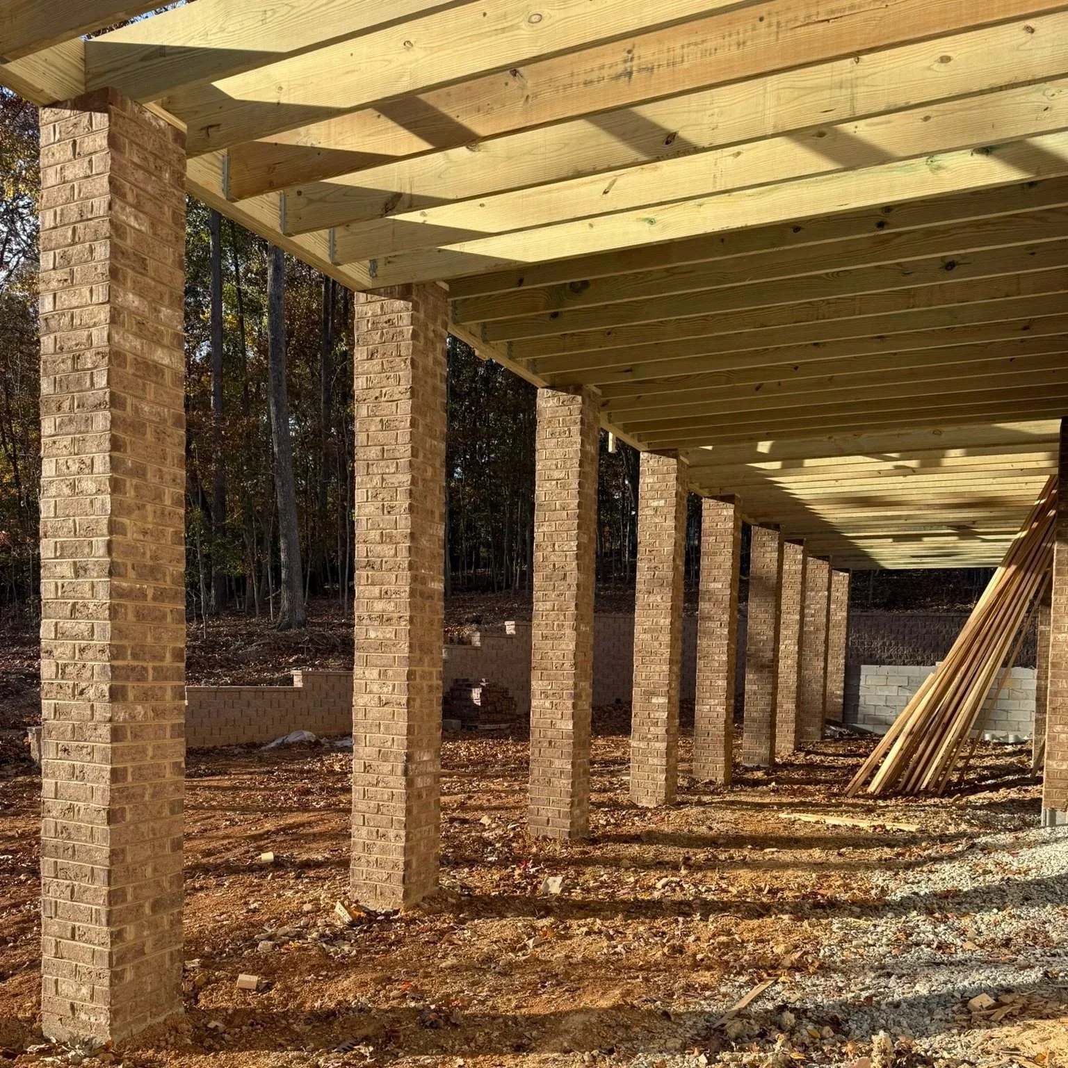 An engineered retaining wall allows for an abundance of flat backyard and entertaining space just off the walk-out basement.