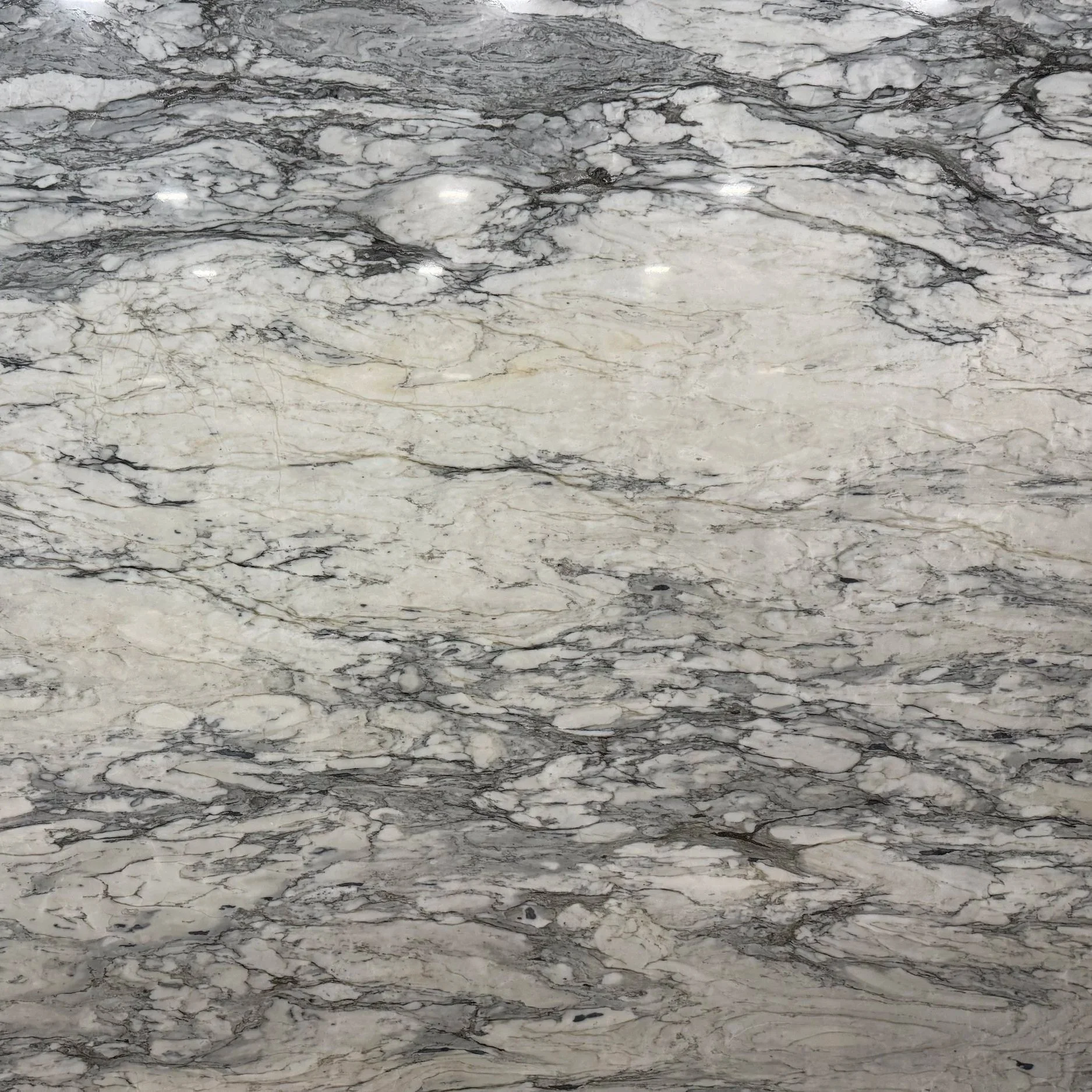 Soapstone Perimeter Countertops w/ Full-Height Backsplash and Italian Marble Island