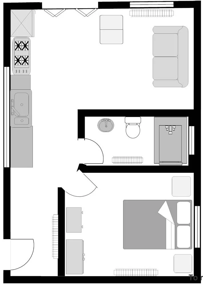 Floor plan of a small apartment with a combined living room and kitchen, one bedroom, and a bathroom.
