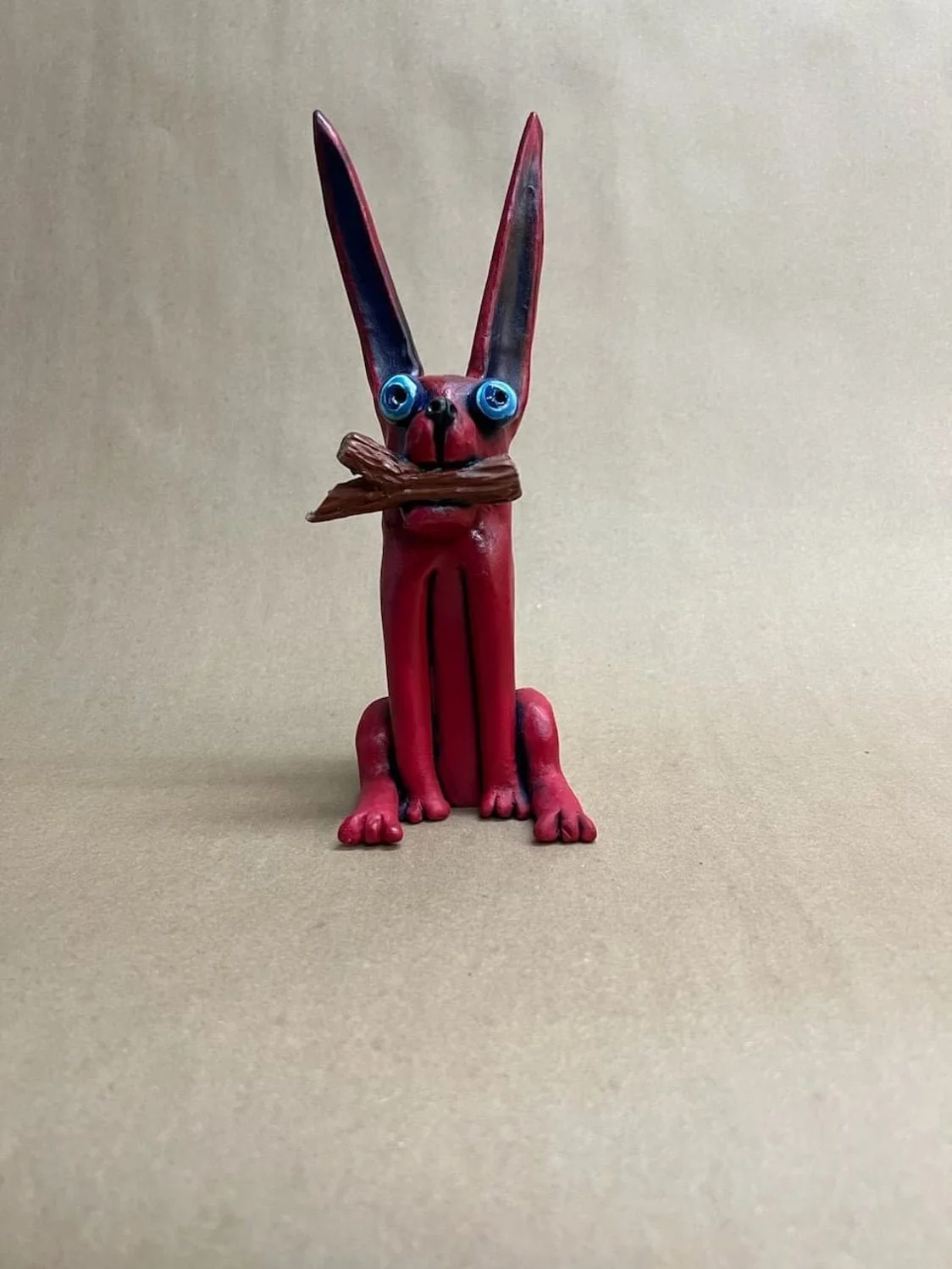 Red Dog with A Log by Chris Menconi