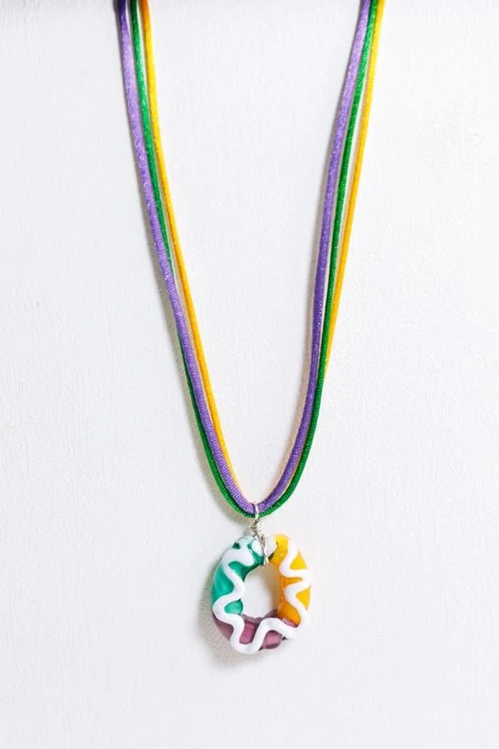 Large King Cake Necklace by Carol Flannery