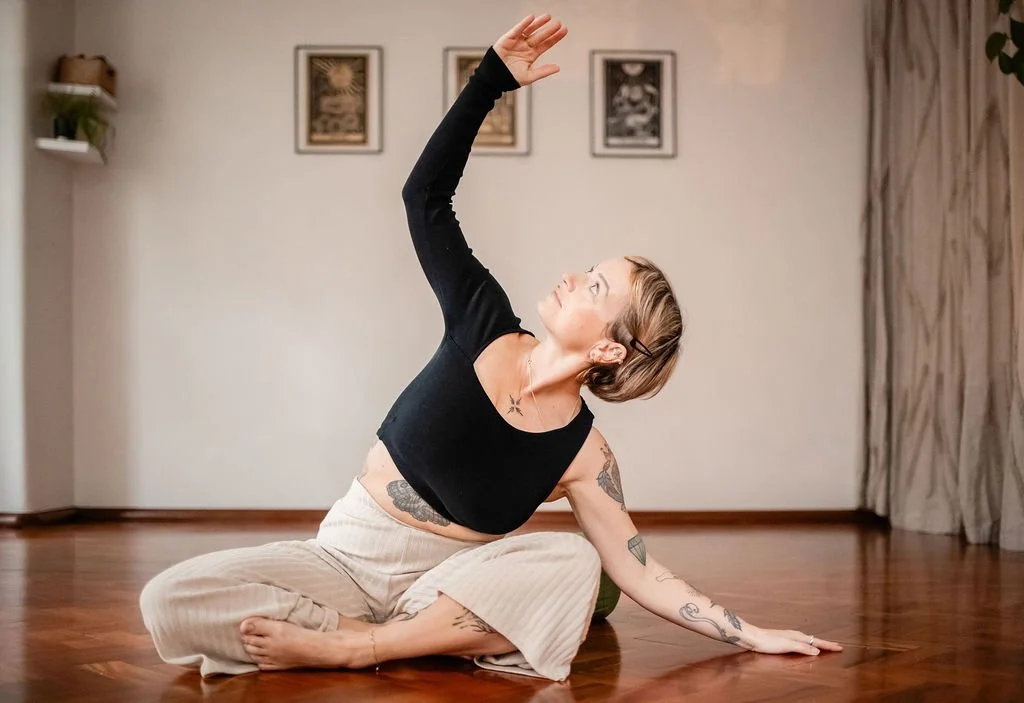 seatedwomanonfloorpracticingyoga
