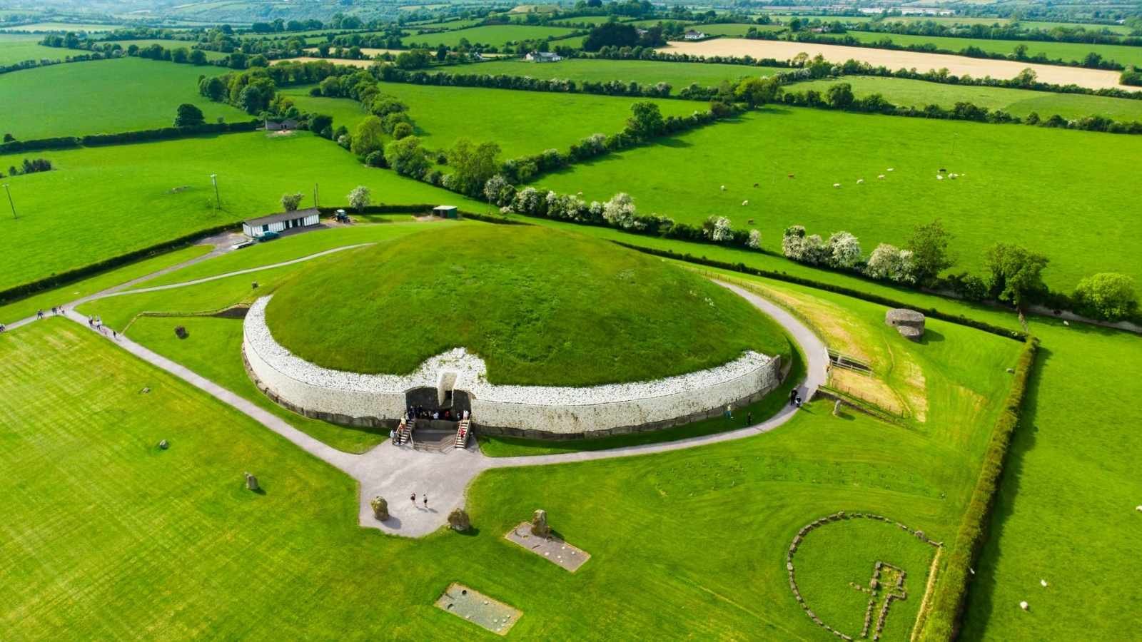 Newgrange in County Meath, a prehistoric passage tomb older than Stonehenge and the Egyptian pyramids, offering insight into Ireland’s ancient past and featured on private heritage tours.