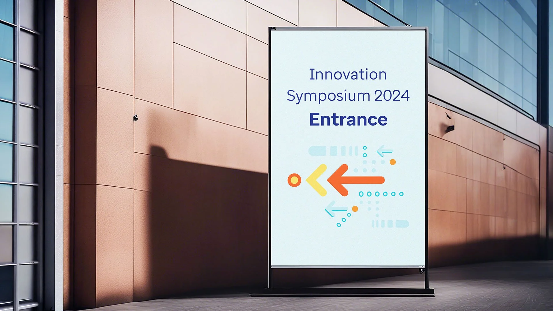 Outdoor sign for Innovation Symposium 2024, indicating the entrance with colorful arrows pointing left.