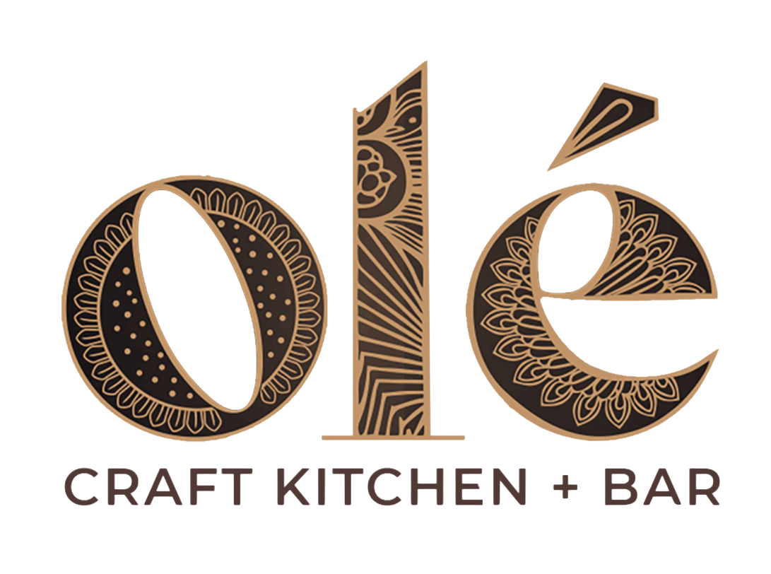 Official logo for Olé Craft Kitchen + Bar, featuring intricate mandala-style patterns within the typography, reflecting our Indian-Mexican global fusion identity in Kendall Park, NJ.