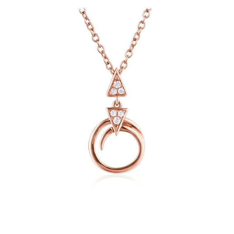 Rose gold necklace with a circle pendant and geometric decorative elements adorned with small diamonds.