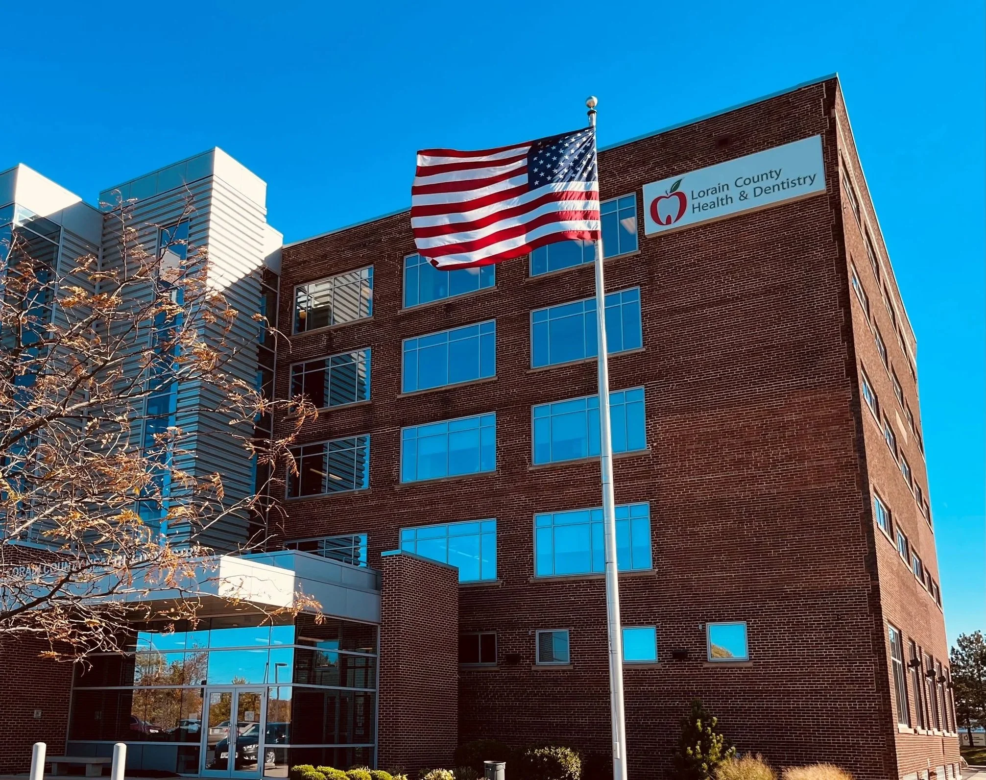 flag flying in front of the lorain broadway location