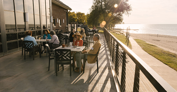 outdoor event shot showing people sitting during set