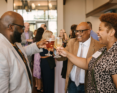 people cheering drinks