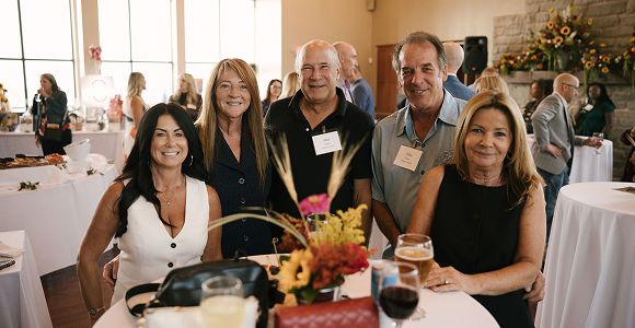 group of people smiling for the camera