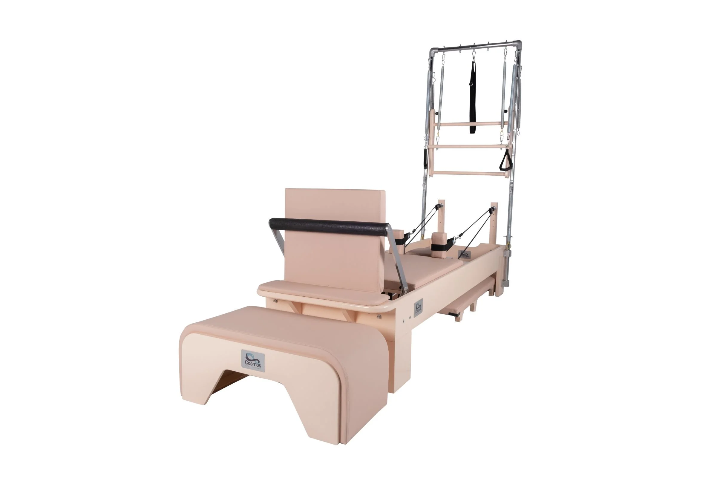 A Pilates reformer machine with various attachments for exercise.