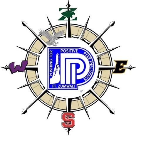 A compass rose with a blue and white emblem at the center reading "Pushing for Positive Peer Influence FT. Zumwalt." The compass features four cardinal direction points labeled W, E, S, and N, with a dragon, an eagle, a knight's helmet, and a wolf positioned at the top, right, bottom, and left respectively.