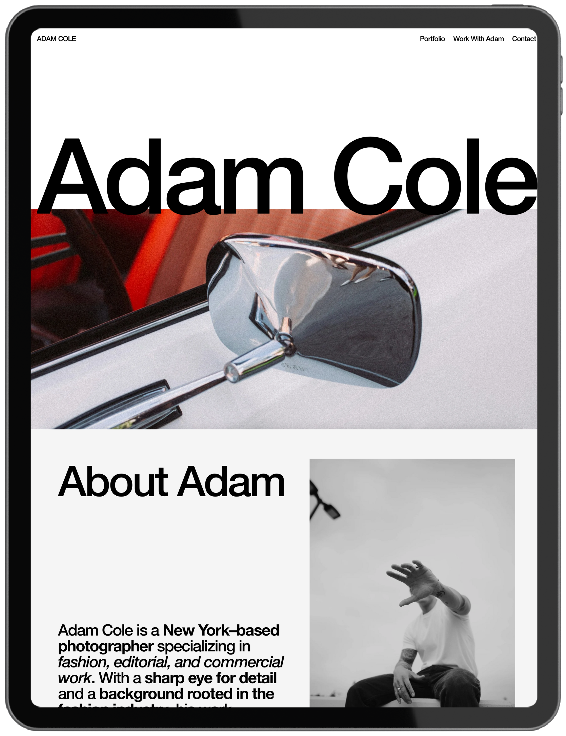 A screenshot of a personal website featuring photographer, with a large text overlay of his name, a photo of a person wearing a white shirt with tattoos, and navigation links for Portfolio, Work With Adam, and Contact.
