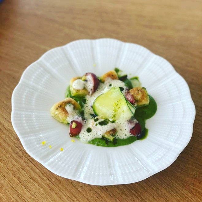 Goats cheese gnocchi, courgette, black cherries
