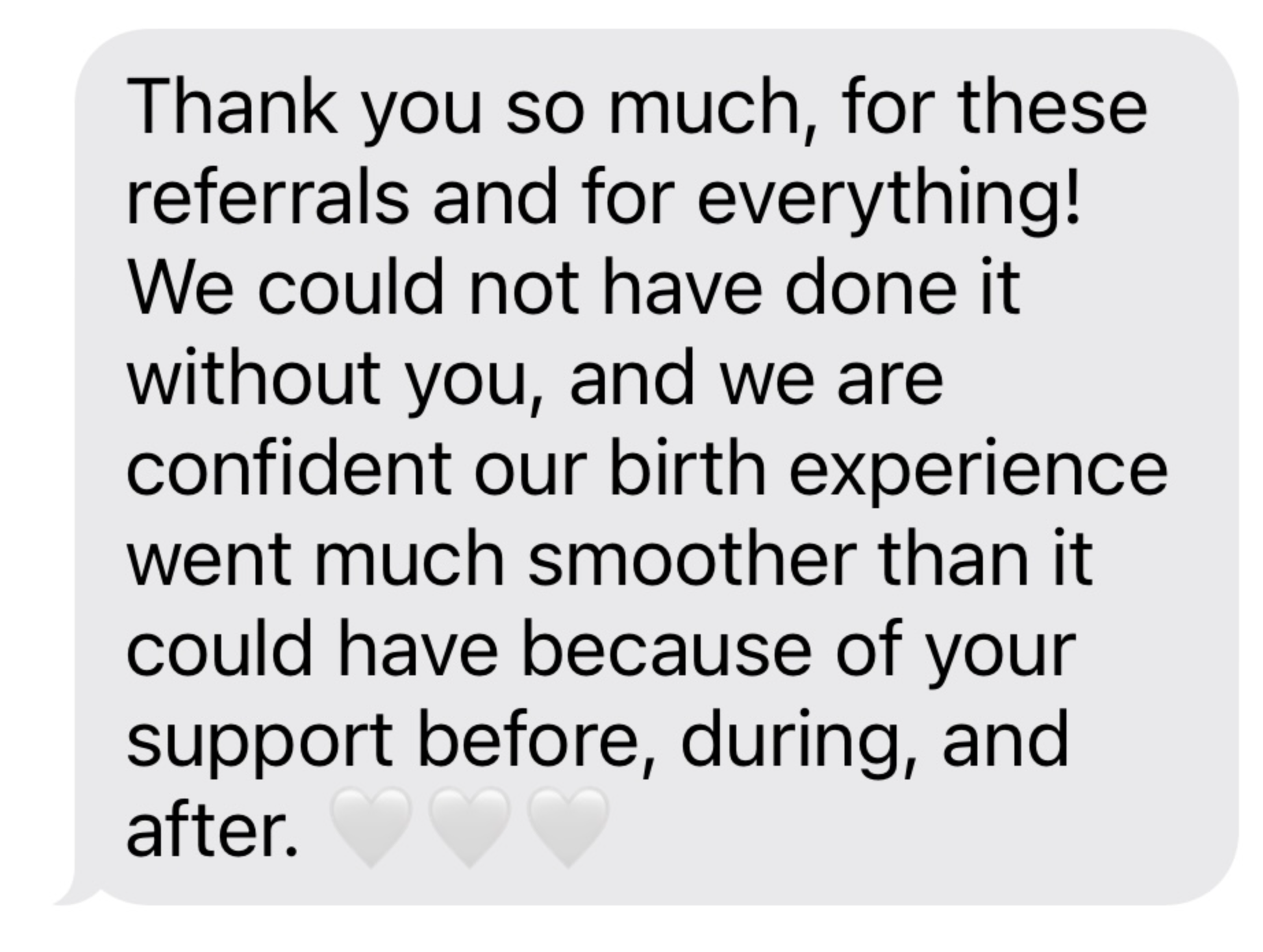 Text message on a smartphone screen expressing gratitude for referrals and support, mentioning the positive impact on the birth experience.