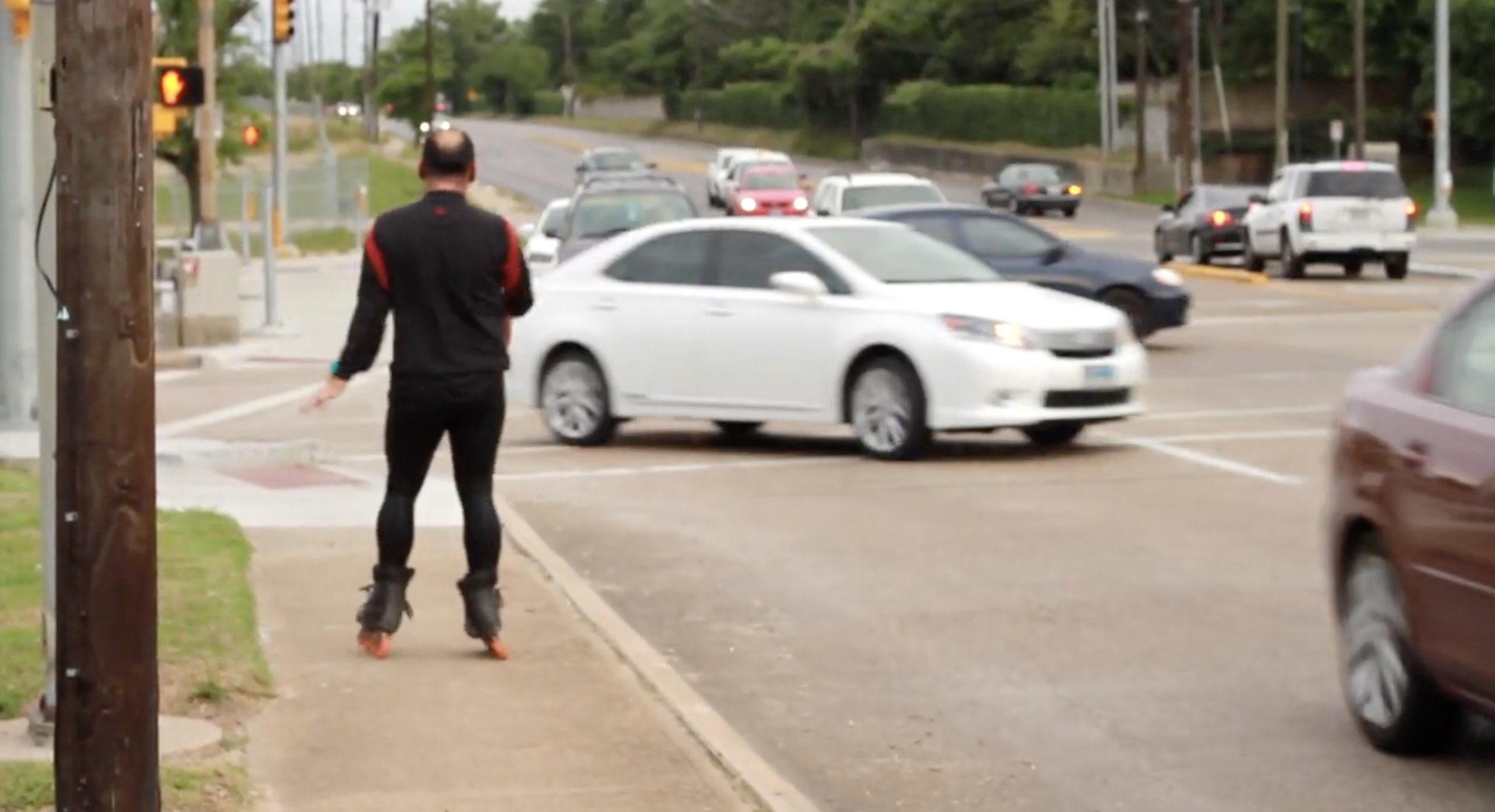 Rollerblader skates on Montrose Ave in Houston