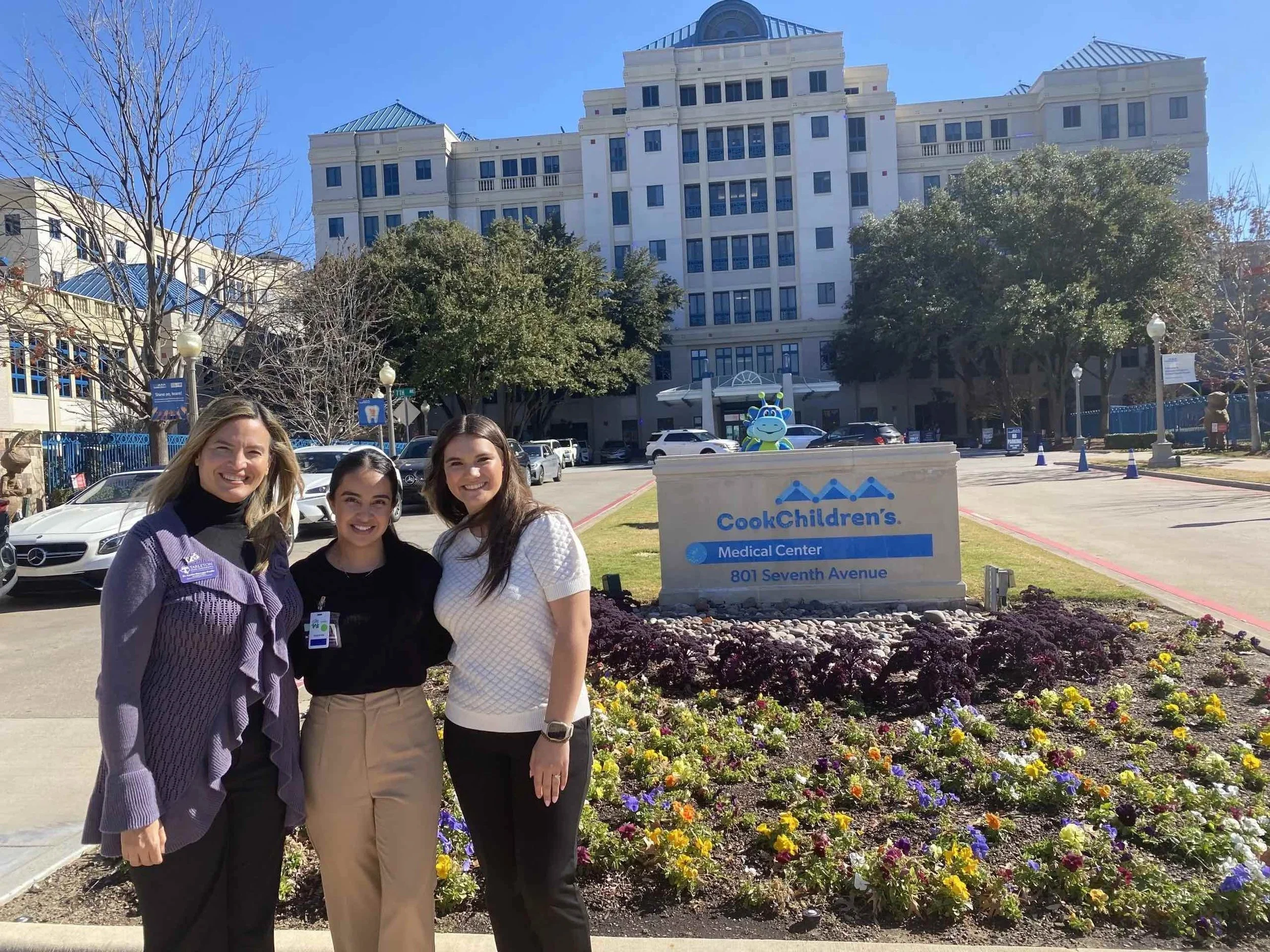 Tarleton students stand in front of Cook Children's hospital