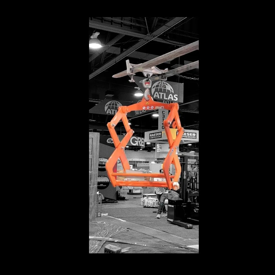 Ecology block clamp lifted by forklift and fully extended to show the structure