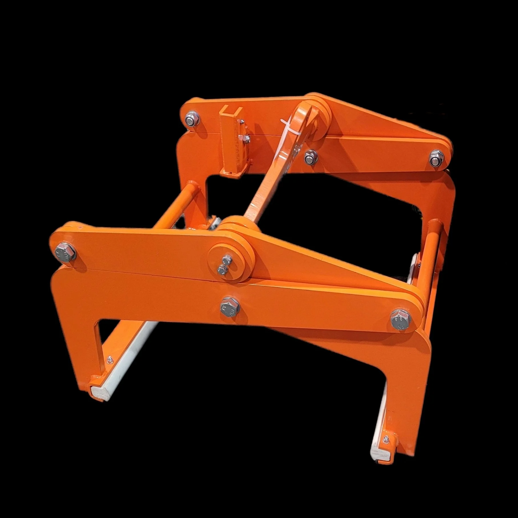 Top view of Ecology block clamp from Eichinger on a black background. Available for rent.