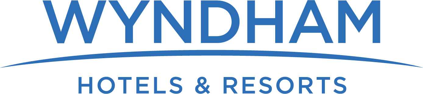 The logo of Wyndham Hotels & Resorts with the company's name in blue, stylized text and a curved line underneath.
