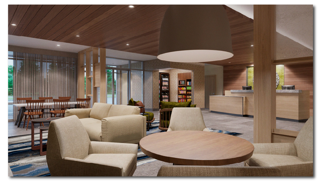 A spacious Staybridge Suites hotel SRD lobby with beige and green furniture, a reception desk, and a vending machine area with snack and drink options, featuring wooden accents and large windows.