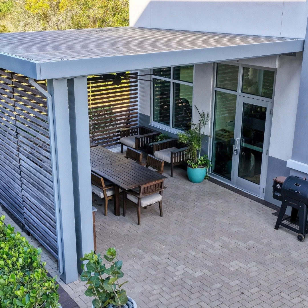 Who needs a small aluminum canopy for a cozy backyard set up??? 
Here&rsquo;s a canopy we did at a corporate building that looks suspiciously like a backyard hang out. 
This complimented with some louvered sun shades along the sides of the building f