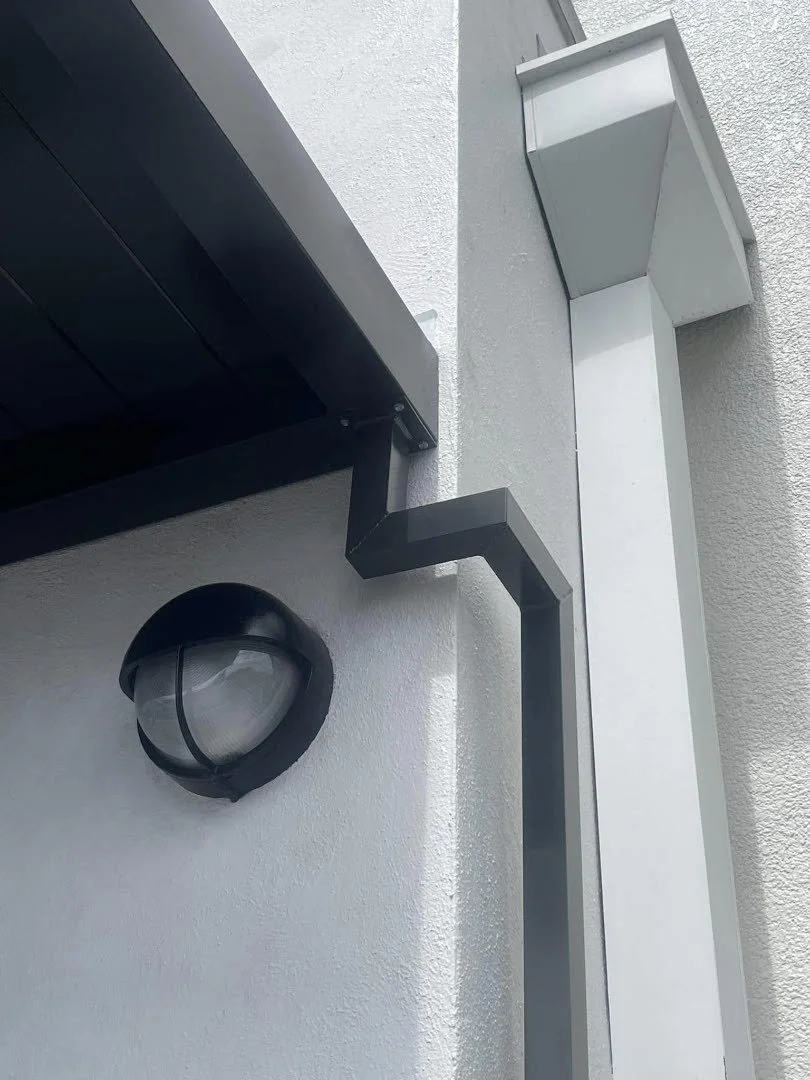 Starbucks drivethrough rain canopy, close-up