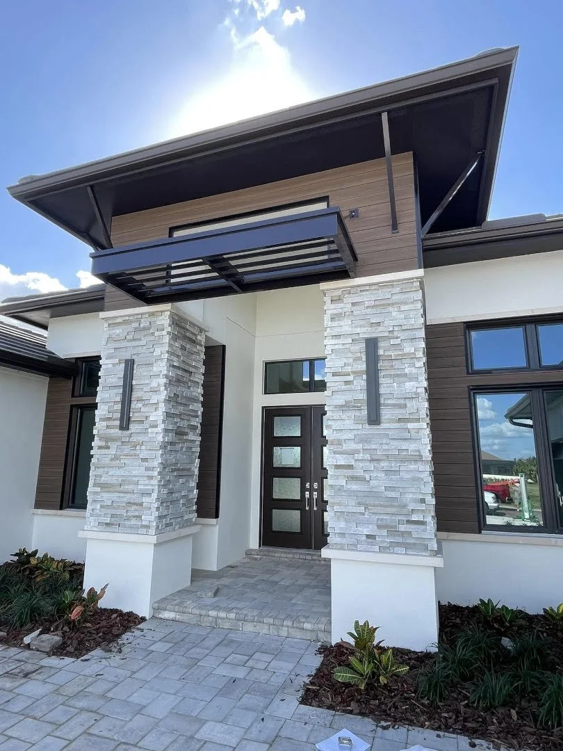 Home entrance louvered awning