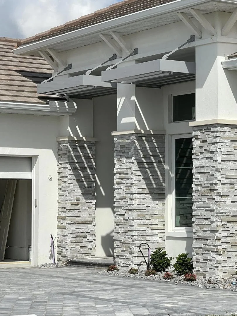 Residential louvered awning sunshades
