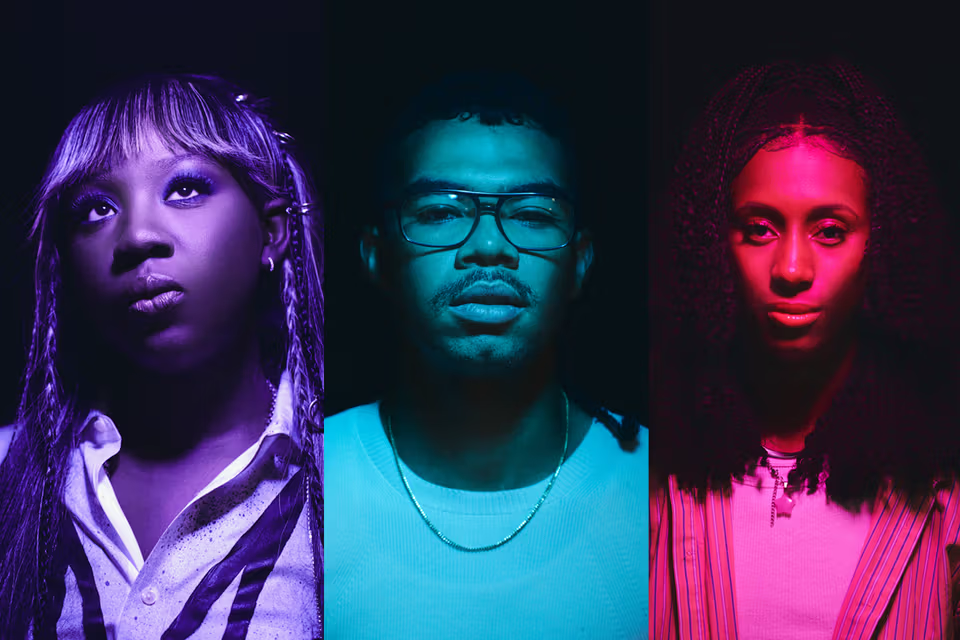 Three diverse individuals illuminated by colorful neon lighting against a dark background.