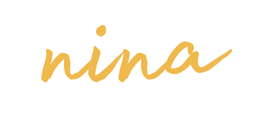 The name 'Nina' written in gold cursive on a transparent background.