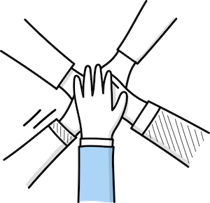 Four hands stacking together in a show of teamwork and collaboration.