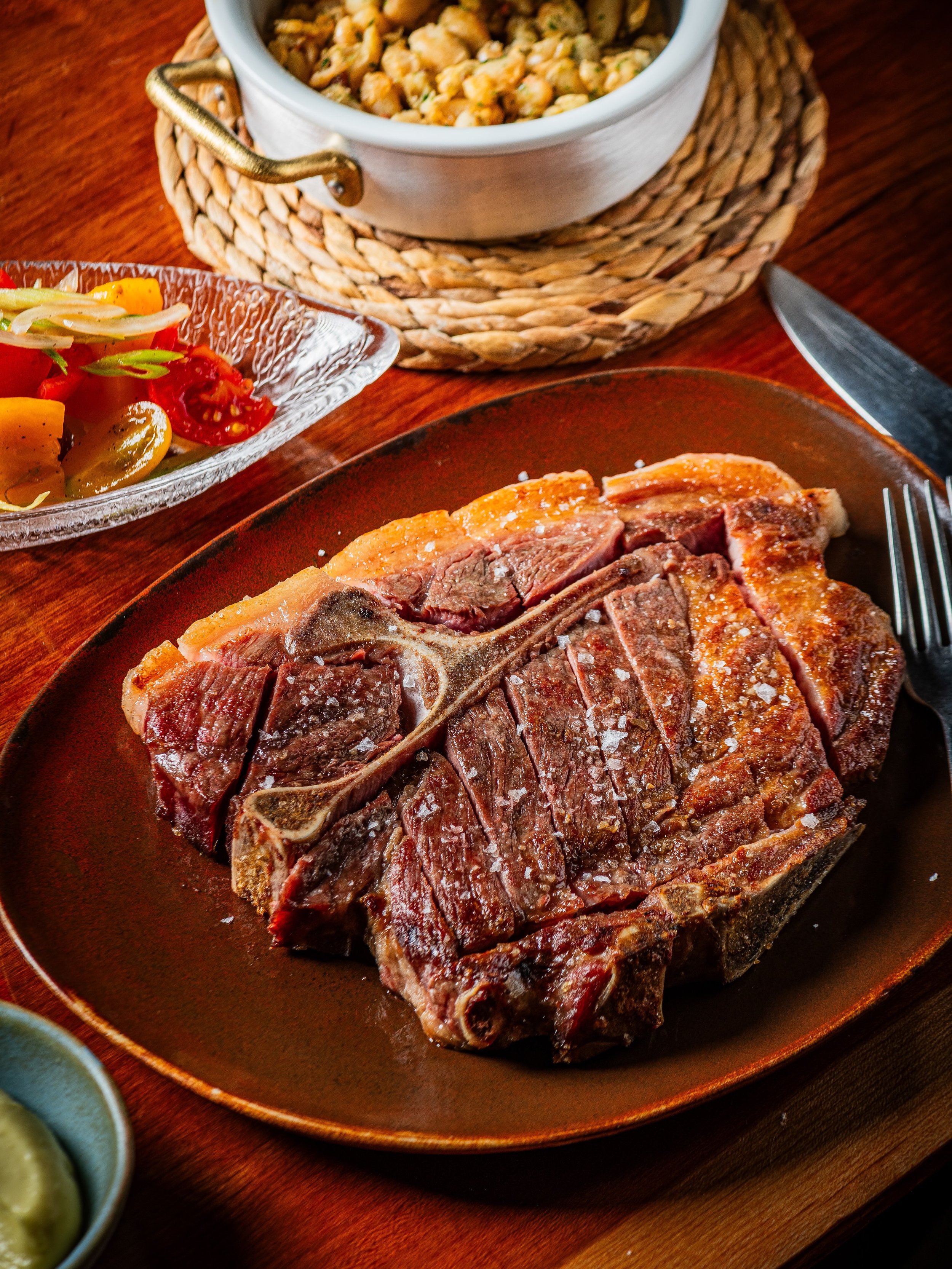 Inspired by Spain. Raised in Virginia.

Cabecero de cerdo, or pork collar, is one of Spain&rsquo;s most prized cuts. Richly marbled and incredibly tender, it&rsquo;s the kind of ingredient that reminds us great cooking starts long before the kitchen.