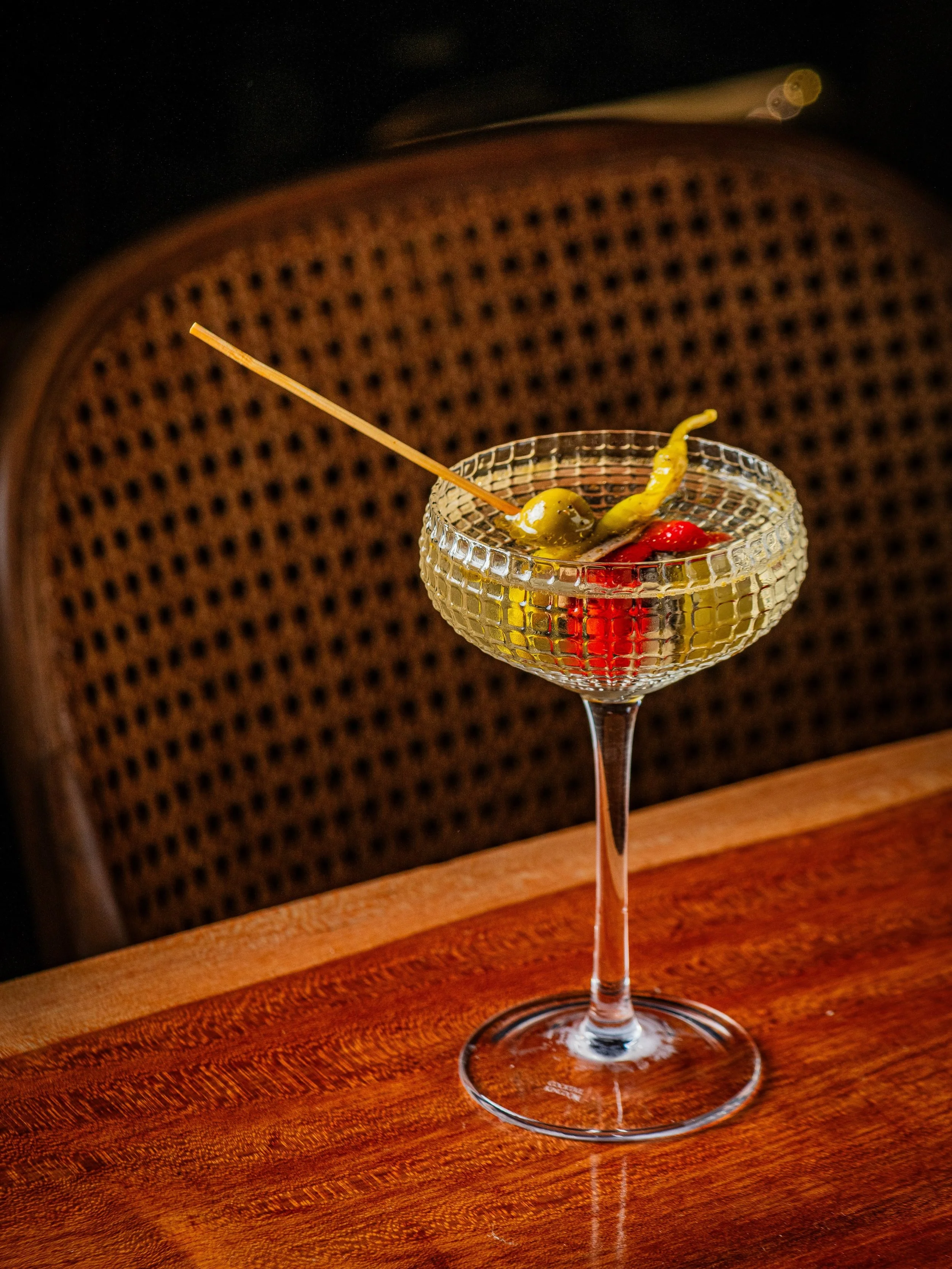 Our dirtiest martini yet. 

The Aguagilda is built on Gin Mare, La Gitana manzanilla, and Atxa dry vermouth&mdash;finished with a Gilda Cl&aacute;sica, an iconic pintxo.

Legend has it a regular at a San Sebasti&aacute;n bar skewered an olive, an anc