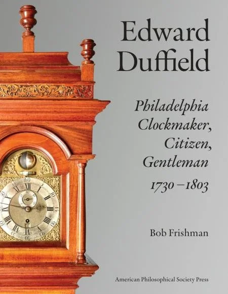 A book cover with an ornate clock