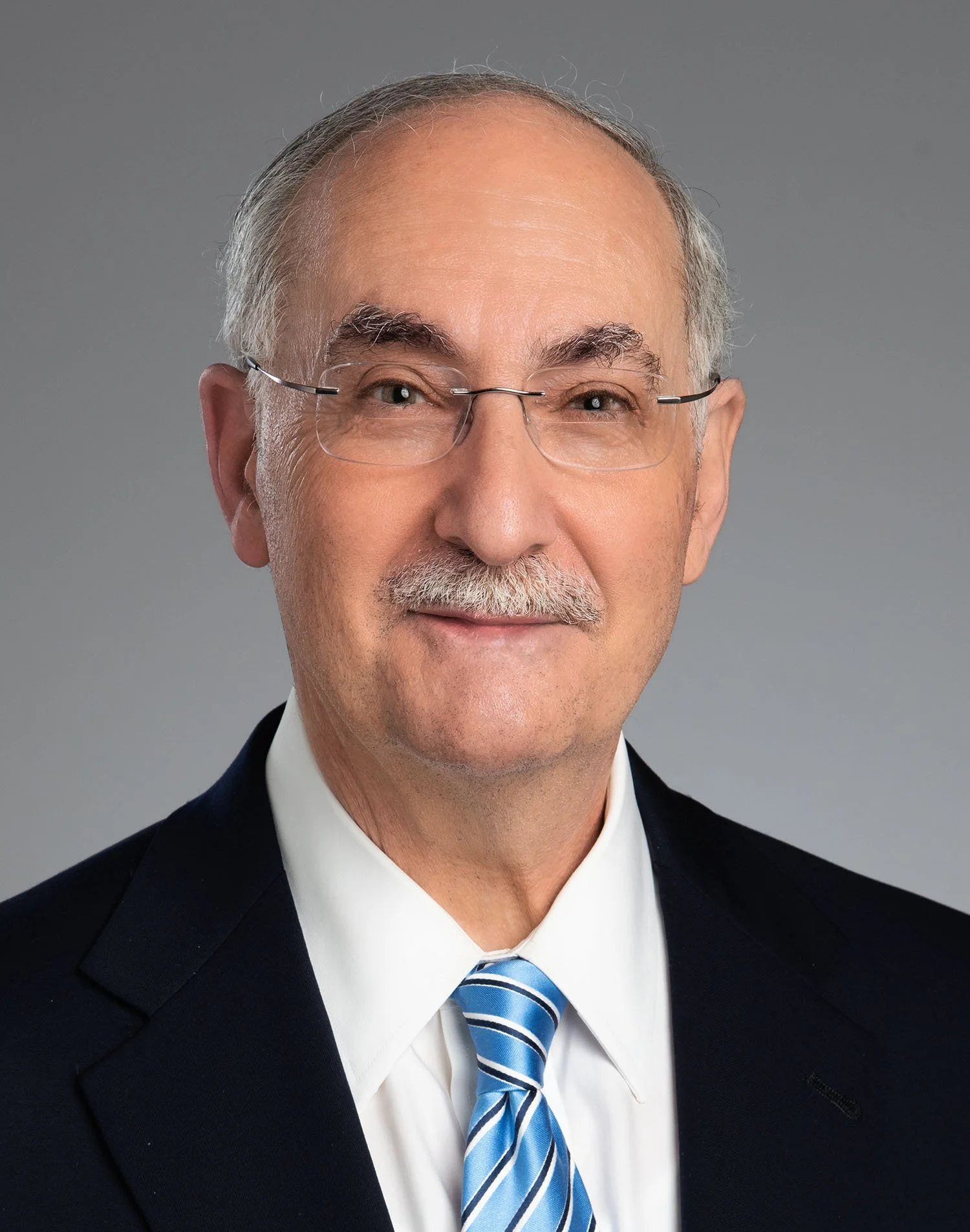 A man in a dark suit